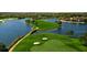 Stunning aerial view of golf course and lakefront property at 1532 Eagle Ridge Dr, Lakeland, FL 33813