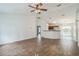 Spacious living room with tile floors and a breakfast bar at 4755 Nw 61St Ave, Ocala, FL 34482