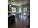 Kitchen with tile floor, breakfast nook, and access to a patio at 348 Magneta Loop, Auburndale, FL 33823