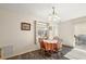 Bright dining room with round table and four chairs at 16938 Se 94Th Sunnybrook Cir, The Villages, FL 32162