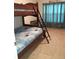 ' bedroom with a bunk bed and cheerful decor, ideal for children at 4005 Santa Maria Dr # 103, Kissimmee, FL 34741