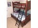 bedroom featuring a wooden bunk bed at 4005 Santa Maria Dr # 103, Kissimmee, FL 34741