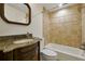 Clean bathroom with granite vanity, tiled shower, and tub at 1250 S Pennsylvania Ave # 8, Winter Park, FL 32789