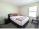 Bedroom with a double bed and nightstand at 2905 Black Birch Dr, Ocoee, FL 34761