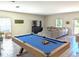 Spacious game room featuring a pool table and comfortable seating at 2905 Black Birch Dr, Ocoee, FL 34761