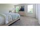 Spacious main bedroom with carpeted floors and natural light at 2905 Black Birch Dr, Ocoee, FL 34761