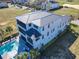 High-end home with tile roof, pool, and lush landscaping at 550 Muirfield Loop, Reunion, FL 34747