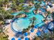 Expansive resort-style pool with lounge chairs at 550 Muirfield Loop, Reunion, FL 34747