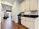 Convenient wet bar with microwave, mini-fridge and sink at 550 Muirfield Loop, Reunion, FL 34747