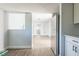 Kitchen area with stainless steel appliances and view into living room at 18925 3Rd Ave, Orlando, FL 32820