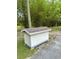 Outdoor storage shed with shingle roof and gray siding at 2360 Sw 6Th Ave, Ocala, FL 34471