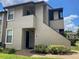Two-story condo building with private entrance and landscaping at 2923 Antique Oaks Cir # 37, Winter Park, FL 32792