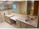 Bathroom with dual vanity and bathtub at 4422 Meadowood St, Orlando, FL 32812