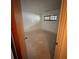 Empty bedroom with window and doors to other rooms at 4422 Meadowood St, Orlando, FL 32812