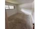 Spacious bedroom with large window and closet at 4422 Meadowood St, Orlando, FL 32812