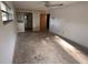 Empty bedroom with patterned wallpaper and ceiling fan at 4422 Meadowood St, Orlando, FL 32812