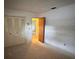 Bedroom with closet and access to other rooms at 4422 Meadowood St, Orlando, FL 32812