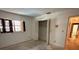 Spacious bedroom with large closet and window at 4422 Meadowood St, Orlando, FL 32812
