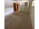 Large bedroom with closet and door to bathroom at 4422 Meadowood St, Orlando, FL 32812