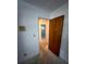 Hallway with doors to other rooms in the house at 4422 Meadowood St, Orlando, FL 32812