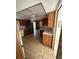 View of kitchen with island, stainless steel appliances, and wood cabinets at 4422 Meadowood St, Orlando, FL 32812