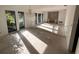 Large living room with hardwood floors and lots of natural light at 4422 Meadowood St, Orlando, FL 32812