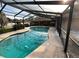 Inviting swimming pool with a screened enclosure at 4422 Meadowood St, Orlando, FL 32812