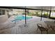 Screened patio overlooking a refreshing pool and spa at 4422 Meadowood St, Orlando, FL 32812