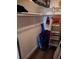 Closet with shelves, hanging rod, and various stored items at 4200 Lake Underhill Rd # A, Orlando, FL 32803