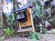 Electrical box mounted on a wooden post at 891 Michigan St, Sanford, FL 32773