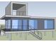 Modern two-story home on stilts with a staircase, glass walls, and balconies at 891 Michigan St, Sanford, FL 32773