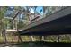 Home under construction with exposed steel framing and wooden stairs at 891 Michigan St, Sanford, FL 32773