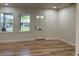 Bright and airy living room with large windows and wood flooring at 1632 E Ridgewood St, Orlando, FL 32803