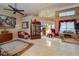 Living room features tile flooring, high ceilings, and decorative accents at 1900 Cherokee Hammock, Deland, FL 32720