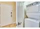 Stackable washer and dryer in a small laundry room at 1301 Tuscan Ter # 9401, Davenport, FL 33896