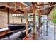 Covered boat lift with a classic boat and a charming gate at 24120 Mink Rd, Astor, FL 32102