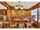Rustic dining room with a large wooden table and six chairs at 24120 Mink Rd, Astor, FL 32102