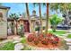 Ornate front entrance with stone accents and landscaping at 24120 Mink Rd, Astor, FL 32102