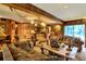Nautical themed living room with comfortable seating and a large TV at 24120 Mink Rd, Astor, FL 32102