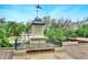 Unique rooftop cupola with weathervane and property name at 24120 Mink Rd, Astor, FL 32102