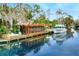 Serene canal view with private dock and screened-in porch at 24120 Mink Rd, Astor, FL 32102