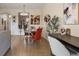 Elegant dining area with modern table and chairs, plus a home office space at 527 Miramar Ave, Davenport, FL 33897