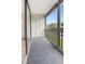 Private balcony overlooking green space at 3800 Saxon Dr # C-52, New Smyrna Beach, FL 32169
