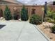 Large backyard patio with decorative concrete and landscaping at 2292 Richey Rd, The Villages, FL 32163