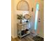 Bright entryway with decorative mirror and console table at 2292 Richey Rd, The Villages, FL 32163