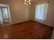 Dining room with hardwood floors and natural light at 2721 Woodland Hills Ave, Lakeland, FL 33803