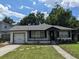 House exterior showcasing a renovated facade at 2721 Woodland Hills Ave, Lakeland, FL 33803
