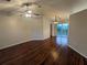 Spacious living room with hardwood floors and access to a patio at 6059 Magpie Dr, Lakeland, FL 33809