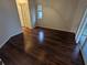 Spacious bedroom with wood-look flooring and access to patio at 6059 Magpie Dr, Lakeland, FL 33809