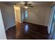Large bedroom with ceiling fan and laminate flooring at 6059 Magpie Dr, Lakeland, FL 33809